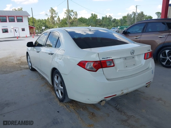 2009 Acura TSX with VIN JH4CU266X9C012935, listed as a IAAI auction lot 41918164 with 158,220 mi miles. Bid and sale history available at carsss.com. Image 3.