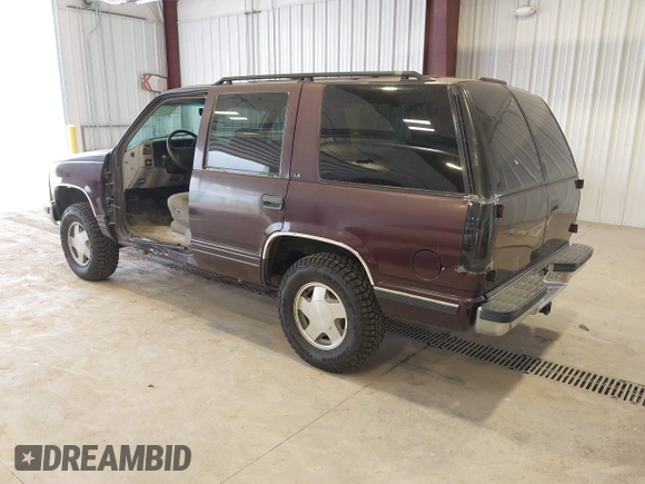 1996 Chevrolet Tahoe z VIN 1GNEK13R3TJ387858, wystawiony jako IAAI lot #41675147 z przebiegiem 196 811 mil mil oraz . Historia ofert i sprzedaży dostępna na DreamBid. Obrazek 3.