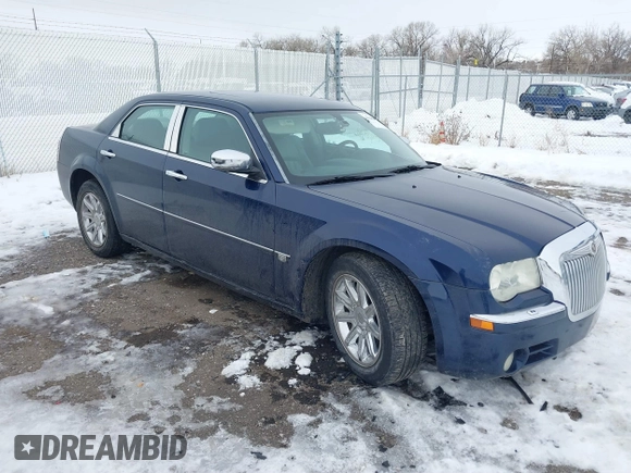 2006 Chrysler 300 C with VIN 2C3LA63H96H289693, listed as a IAAI auction lot 41308366 with 128,814 mi miles. Bid and sale history available at carsss.com. Image 1.