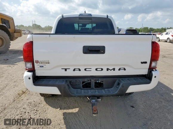 2018 Toyota Tacoma SR z VIN 3TMCZ5AN0JM178886, wystawiony jako Copart lot #56330495 z przebiegiem 71 962 mil mil oraz Szkoda całkowita • Salvage title. Historia ofert i sprzedaży dostępna na DreamBid. Obrazek 6.