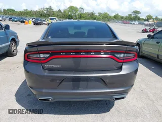 2015 Dodge Charger SE z VIN 2C3CDXBGXFH751491, wystawiony jako IAAI lot #41907243 z przebiegiem 112 545 mil mil oraz . Historia ofert i sprzedaży dostępna na DreamBid. Obrazek 16.