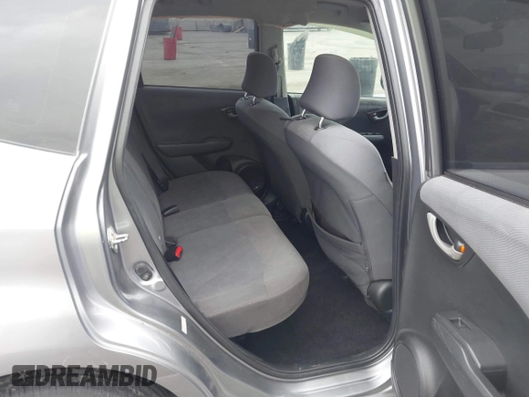 2009 Honda Fit with VIN JHMGE88279S055565, listed as a IAAI auction lot 41896359 with 184,618 mi miles. Bid and sale history available at carsss.com. Image 8.