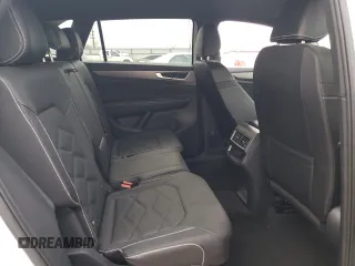 2024 Volkswagen Atlas SE с VIN 1V2DE2CA0RC244941, выставлен на аукционе Copart как лот 84553054 с пробегом 9 миль миль и Списание • Salvage title. История ставок и продаж доступна на DreamBid. Изображение 11.