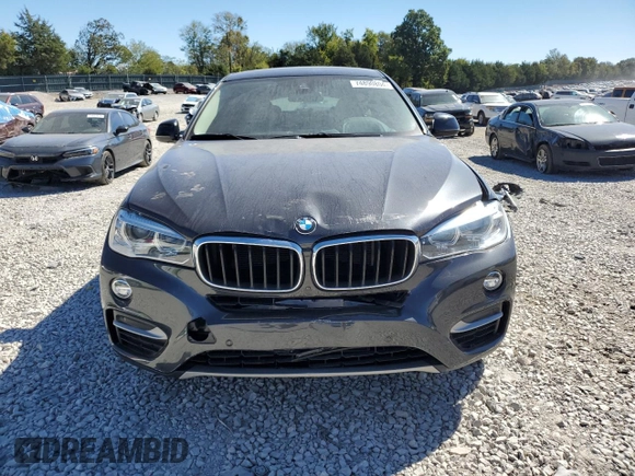 2016 BMW X6 sDrive35i with VIN 5UXKU0C5XG0F92975, listed as a Copart auction lot 74890804 with 64,231 mi miles and Salvage Title. Bid and sale history available at carsss.com. Image 5.