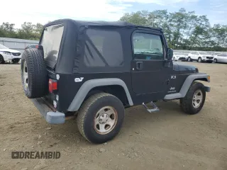 2005 Jeep Wrangler X with VIN 1J4FA39S85P350479, listed as a Copart auction lot 72330304 with 155,856 mi miles and Salvage Title. Bid and sale history available at carsss.com. Image 3.
