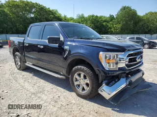 2021 Ford F-150 XL with VIN 1FTFW1E5XMFA47980, listed as a Copart auction lot 56737215 with 63,781 mi miles and Salvage title. Bid and sale history available at DreamBid. Image 4.