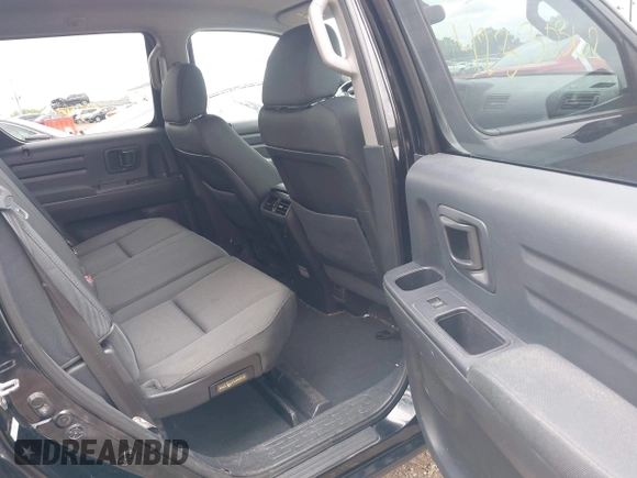 2013 Honda Ridgeline Sport with VIN 5FPYK1F73DB016232, listed as a IAAI auction lot 42330362 with 214,668 mi miles and . Bid and sale history available at DreamBid. Image 8.
