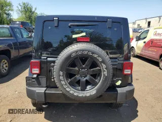 2014 Jeep Wrangler Unlimited Sahara with VIN 1C4HJWEG5EL312006, listed as a Copart auction lot 61821445 with 159,416 mi miles and Salvage title. Bid and sale history available at DreamBid. Image 6.