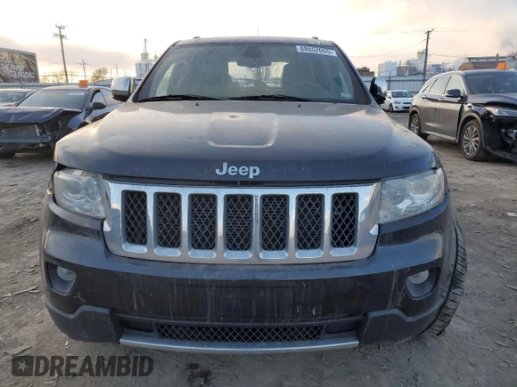 2011 Jeep Grand Cherokee Overland with VIN 1J4RR6GT8BC517168, listed as a Copart auction lot 88652055 with 175,431 mi miles and Salvage title. Bid and sale history available at DreamBid. Image 5.