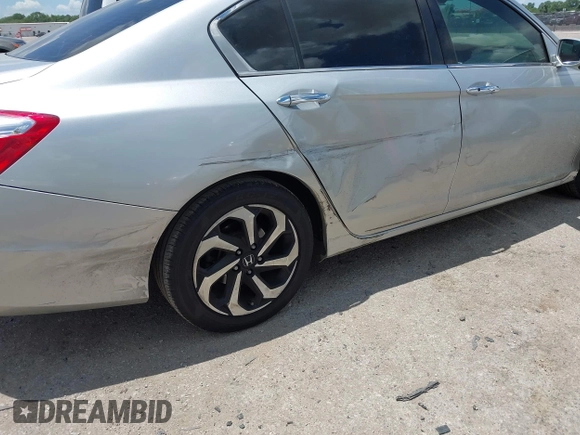 2015 Honda Accord EX-L with VIN 1HGCR2F86FA071607, listed as a IAAI auction lot 42581649 with 206,200 mi miles and . Bid and sale history available at DreamBid. Image 6.
