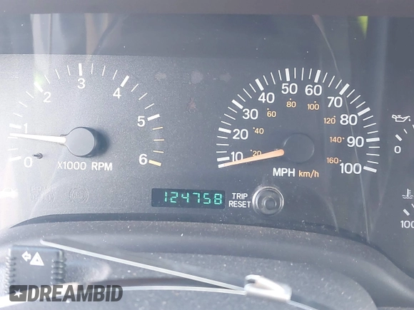 2000 Jeep Cherokee Classic with VIN 1J4FF58S7YL122676, listed as a IAAI auction lot 41710310 with 124,758 mi miles. Bid and sale history available at carsss.com. Image 7.