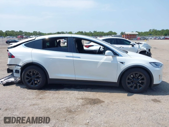 2016 Tesla Model X 70D z VIN 5YJXCBE25GF029372, wystawiony jako IAAI lot #42325335 z przebiegiem 80 071 mil mil oraz . Historia ofert i sprzedaży dostępna na DreamBid. Obrazek 13.