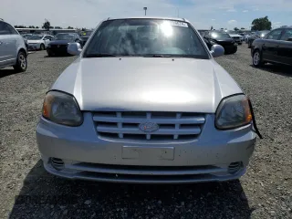 2005 Hyundai Accent GLS with VIN KMHCG45C65U576674, listed as a Copart auction lot 50726074 with 118,532 mi miles and Non Repairable. Bid and sale history available at carsss.com. Image 5.