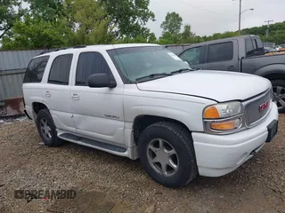2002 GMC Yukon Denali z VIN 1GKEK63U62J248966, wystawiony jako IAAI lot #42366016 z przebiegiem 190 804 mil mil oraz . Historia ofert i sprzedaży dostępna na DreamBid. Obrazek 1.