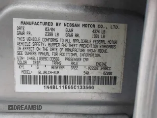 2005 Nissan Altima SE with VIN 1N4BL11E65C133566, listed as a IAAI auction lot 41792300 with 169,733 mi miles. Bid and sale history available at carsss.com. Image 9.