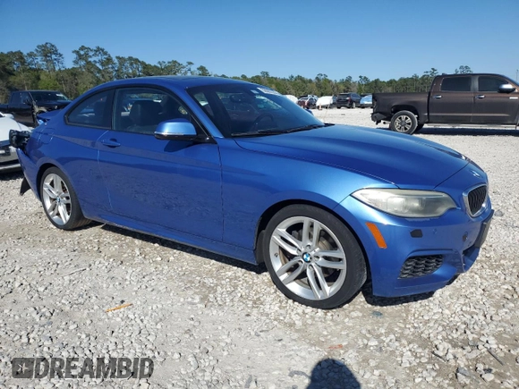 2015 BMW 2 Series 228i with VIN WBA1F5C50FV256672, listed as a Copart auction lot 50062235 with 120,213 mi miles and Salvage Title. Bid and sale history available at carsss.com. Image 4.