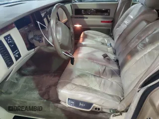 1995 Cadillac Fleetwood z VIN 1G6DW52P5SR715543, wystawiony jako Copart lot #51841755 z przebiegiem 92 222 mil mil oraz Czysty tytuł • Clean title. Historia ofert i sprzedaży dostępna na DreamBid. Obrazek 7.