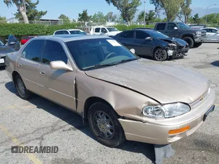 1996 Toyota Camry DX z VIN JT2BG12K0T0347950, wystawiony jako IAAI lot #42248890 z przebiegiem 264 017 mil mil oraz . Historia ofert i sprzedaży dostępna na DreamBid. Obrazek 1.