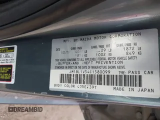 2012 Mazda 3 s Touring with VIN JM1BL1V54C1580099, listed as a IAAI auction lot 42101607 with 108,526 mi miles. Bid and sale history available at carsss.com. Image 9.