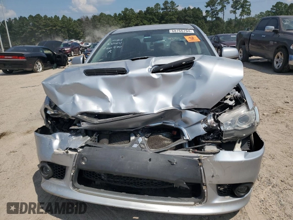 2014 Mitsubishi Lancer Ralliart with VIN JA32V6FV5EU000994, listed as a Copart auction lot 68766704 with 89,276 mi miles and Salvage Title. Bid and sale history available at DreamBid. Image 5.
