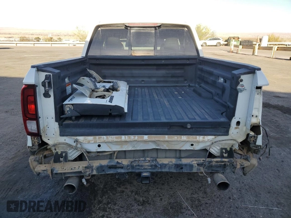 2022 Honda Ridgeline RTL-E with VIN 5FPYK3F77NB031233, listed as a Copart auction lot 49735525 with 71,450 mi miles and Salvage Title. Bid and sale history available at DreamBid. Image 6.