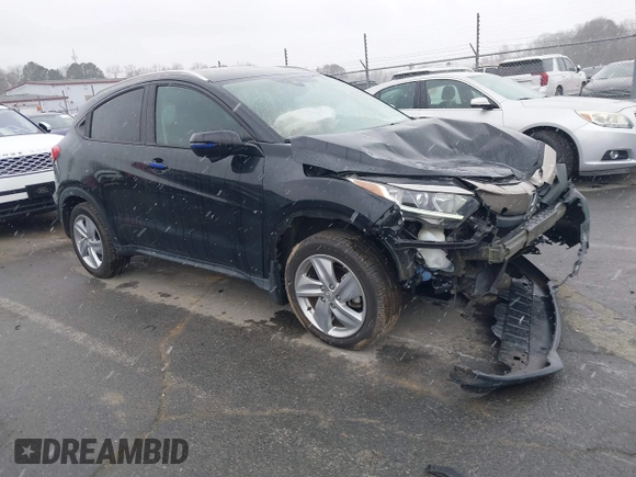 2019 Honda HR-V EX with VIN 3CZRU5H52KM704011, listed as a IAAI auction lot 41616517 with 57,921 mi miles. Bid and sale history available at carsss.com. Image 1.