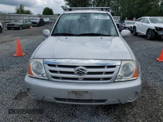 2006 Suzuki XL7 z VIN JS3TX92V564102483, wystawiony jako Copart lot #57185865 z przebiegiem 152 864 mil mil oraz Szkoda całkowita • Salvage title. Historia ofert i sprzedaży dostępna na DreamBid. Obrazek 5.