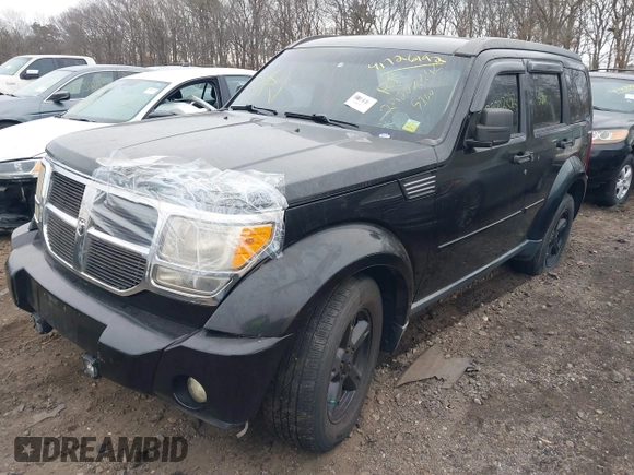 2009 Dodge Nitro SLT with VIN 1D8GU58K19W525618, listed as a IAAI auction lot 41726192 with 999,999 mi miles. Bid and sale history available at carsss.com. Image 2.