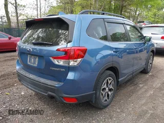 2020 Subaru Forester Premium with VIN JF2SKAJC5LH556992, listed as a IAAI auction lot 42061879 with 71,840 mi miles. Bid and sale history available at carsss.com. Image 4.