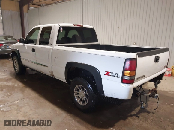 2004 GMC Sierra 1500 SLT with VIN 1GTEK19T34E320179, listed as a IAAI auction lot 41601727 with 303,523 mi miles. Bid and sale history available at carsss.com. Image 3.