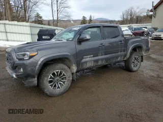 2023 Toyota Tacoma 4WD SR with VIN 3TYCZ5AN2PT156093, listed as a Copart auction lot 45577245 with 33,687 mi miles and Salvage Title. Bid and sale history available at carsss.com. Image 1.