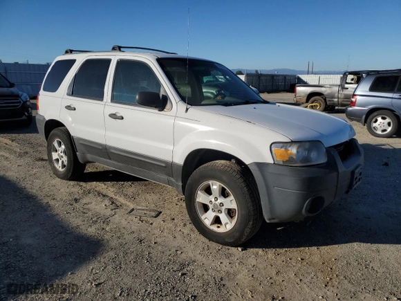 2005 Ford Escape XLT with VIN 1FMYU93115KD39938, listed as a Copart auction lot 88794455 with 133,562 mi miles and Salvage Title. Bid and sale history available at carsss.com. Image 4.
