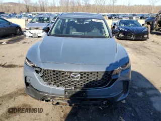 2023 Mazda CX-50 z VIN 7MMVABXM5PN112264, wystawiony jako Copart lot #71907482 z przebiegiem 8 459 mil mil oraz . Historia ofert i sprzedaży dostępna na DreamBid. Obrazek 5.