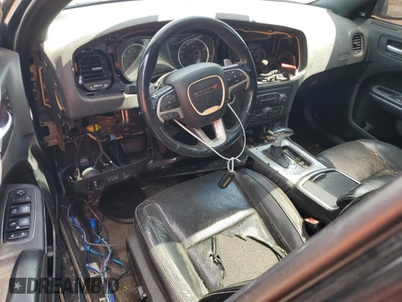 2015 Dodge Charger RT with VIN 2C3CDXCT9FH784672, listed as a Copart auction lot 58190615 with 121,033 mi miles and Salvage title. Bid and sale history available at DreamBid. Image 8.