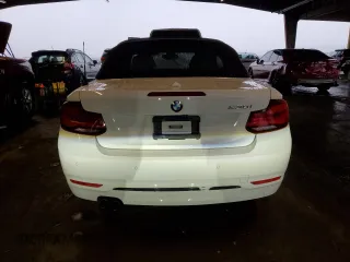 2020 BMW 2 Series 230i with VIN WBA2M7C04L7E23712, listed as a Copart auction lot 86177604 with 50,961 mi miles and Salvage Title. Bid and sale history available at carsss.com. Image 6.
