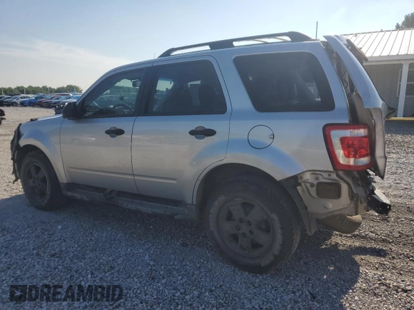 2010 Ford Escape XLS with VIN 1FMCU0C73AKA52802, listed as a Copart auction lot 60100185 with 141,541 mi miles and Clean title. Bid and sale history available at DreamBid. Image 2.