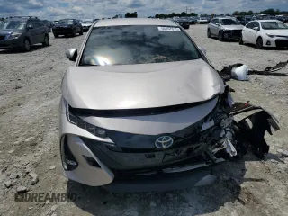 2021 Toyota Prius LE with VIN JTDKAMFPXM3184126, listed as a Copart auction lot 56857675 with 54,676 mi miles and Clean Title. Bid and sale history available at DreamBid. Image 5.