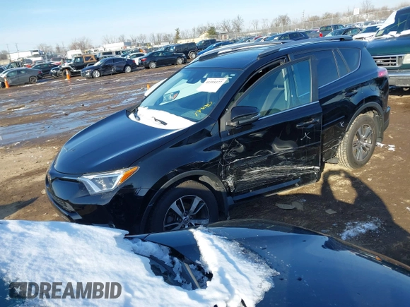 2018 Toyota RAV4 XLE with VIN 2T3RFREV1JW808773, listed as a IAAI auction lot 41595377 with 109,309 mi miles. Bid and sale history available at carsss.com. Image 18.