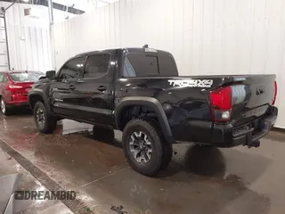 2019 Toyota Tacoma SR with VIN 5TFCZ5AN7KX167511, listed as a IAAI auction lot 42360585 with 65,213 mi miles and . Bid and sale history available at DreamBid. Image 3.
