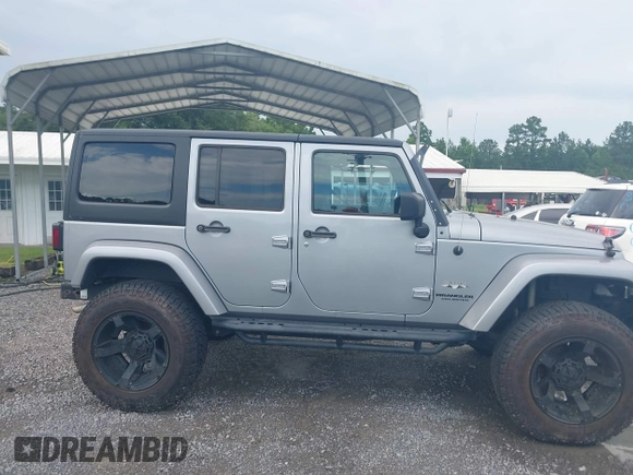 2016 Jeep Wrangler Unlimited Sahara with VIN 1C4BJWEG5GL117872, listed as a IAAI auction lot 42692798 with 119,819 mi miles and . Bid and sale history available at DreamBid. Image 13.