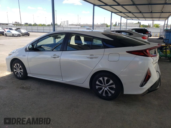 2022 Toyota Prius LE with VIN JTDKAMFP4N3197665, listed as a Copart auction lot 57339955 with 61,063 mi miles and Salvage title. Bid and sale history available at DreamBid. Image 2.