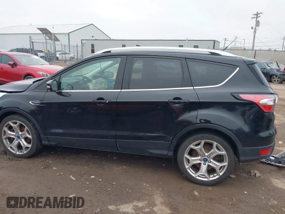 2017 Ford Escape Titanium with VIN 1FMCU0J95HUD37858, listed as a IAAI auction lot 41984629 with 87,163 mi miles and . Bid and sale history available at DreamBid. Image 13.