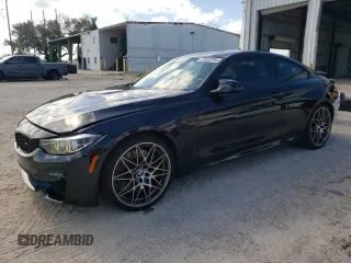 2018 BMW M4 with VIN WBS4Y9C57JAC86460, listed as a Copart auction lot 73022204 with 28,477 mi miles and Salvage Title. Bid and sale history available at carsss.com. Image 1.