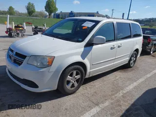2013 Dodge Grand Caravan SXT with VIN 2C4RDGCG2DR522136, listed as a IAAI auction lot 42023561 with 176,635 mi miles and . Bid and sale history available at DreamBid. Image 2.
