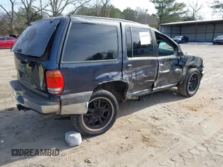 2000 Ford Explorer XLT with VIN 1FMZU63E1YZB81246, listed as a IAAI auction lot 41341700 with 241,373 mi miles and . Bid and sale history available at DreamBid. Image 4.