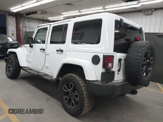 2017 Jeep Wrangler Unlimited Sahara with VIN 1C4BJWEG2HL700840, listed as a IAAI auction lot 42631036 with 60,610 mi miles and . Bid and sale history available at DreamBid. Image 3.