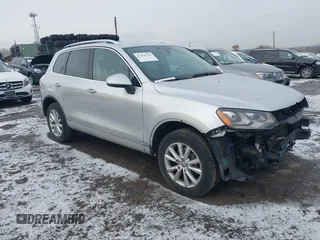2014 Volkswagen Touareg Sport with VIN WVGEF9BP6ED006075, listed as a IAAI auction lot 41478721 with 129,150 mi miles and . Bid and sale history available at DreamBid. Image 1.