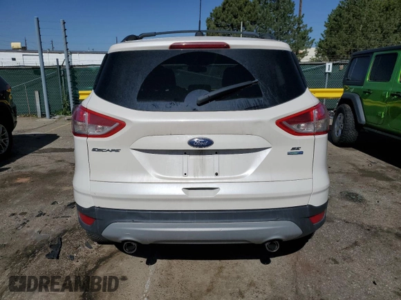 2013 Ford Escape SE z VIN 1FMCU9GX7DUC54856, wystawiony jako Copart lot #54767295 z przebiegiem 130 167 mil mil oraz Szkoda całkowita • Salvage title. Historia ofert i sprzedaży dostępna na DreamBid. Obrazek 6.