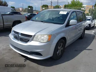 2012 Dodge Grand Caravan SXT with VIN 2C4RDGCG7CR204835, listed as a IAAI auction lot 41948688 with 125,466 mi miles and . Bid and sale history available at DreamBid. Image 2.