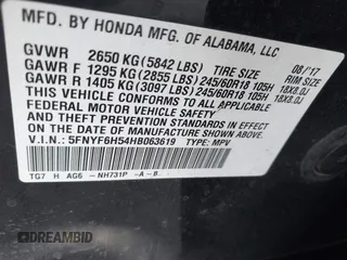 2017 Honda Pilot EX-L with VIN 5FNYF6H54HB063619, listed as a IAAI auction lot 41545415 with Not Provided miles and . Bid and sale history available at DreamBid. Image 9.